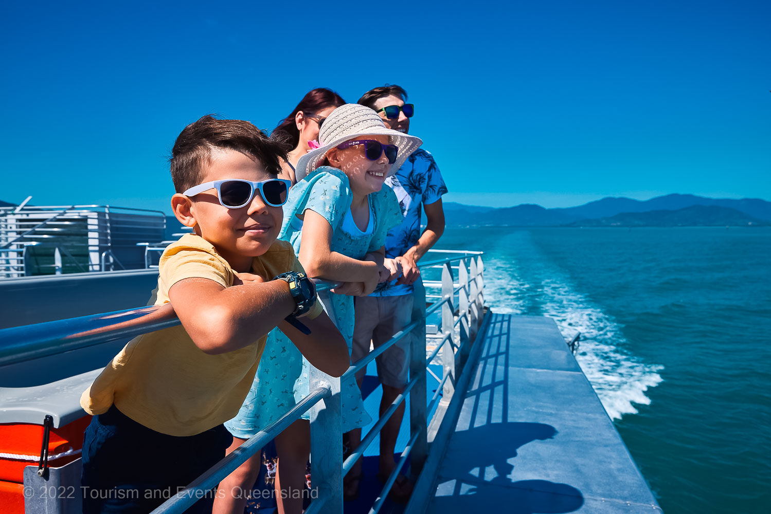 Family on a vessel cruising the Great Barrier Reef  – Australia - © Tourism and Events Queensland