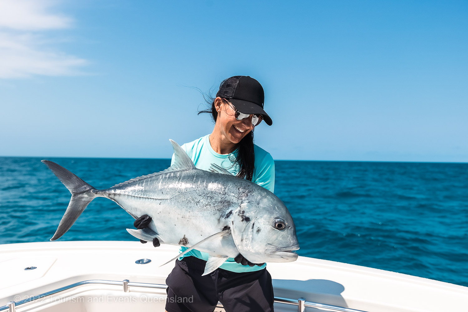 Catching a giant trevally photo - Great Barrier Reef  – Australia - © Tourism and Events Queensland