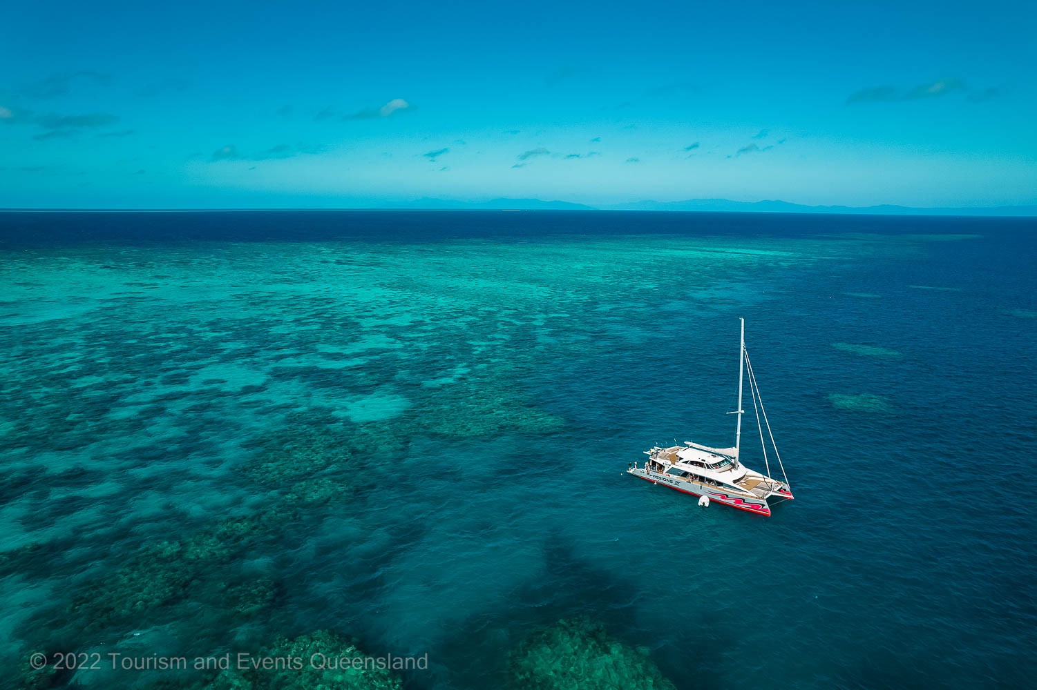 Anchored yacht in protected lagoon