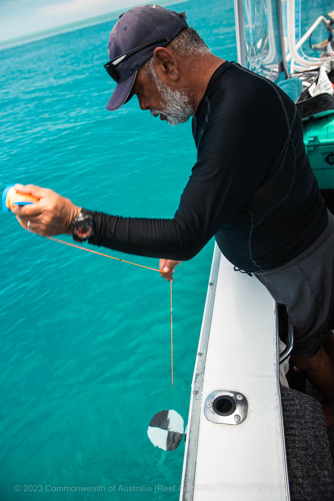 © Commonwealth of Australia - Reef Authority - Tourism Reef Protection Initiative - GBR-Safaris-Traditional Owner Sean doing-a-Secci