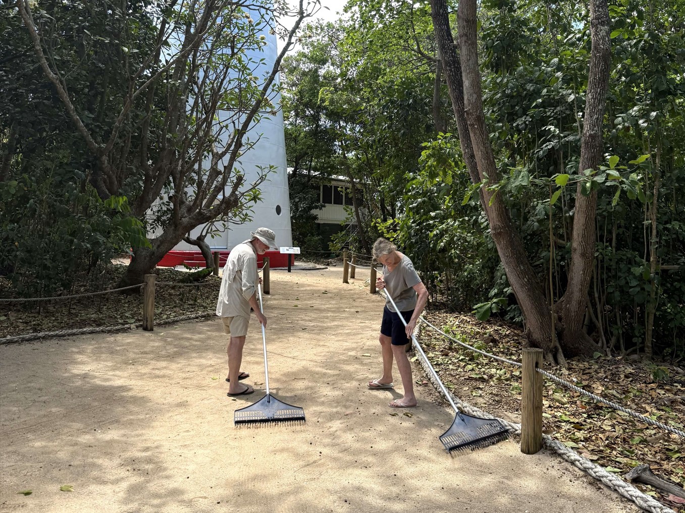 Caretakers raking