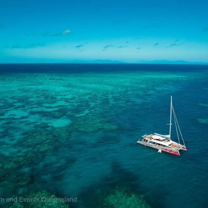 Anchored yacht in protected lagoon
